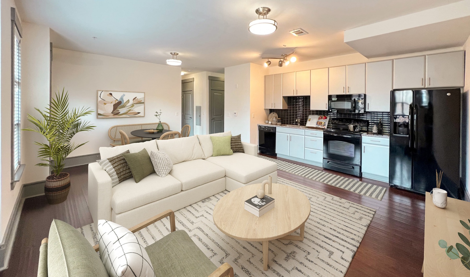 Open concept floor plan with kitchen and living area at Chapel Hill North Apartments