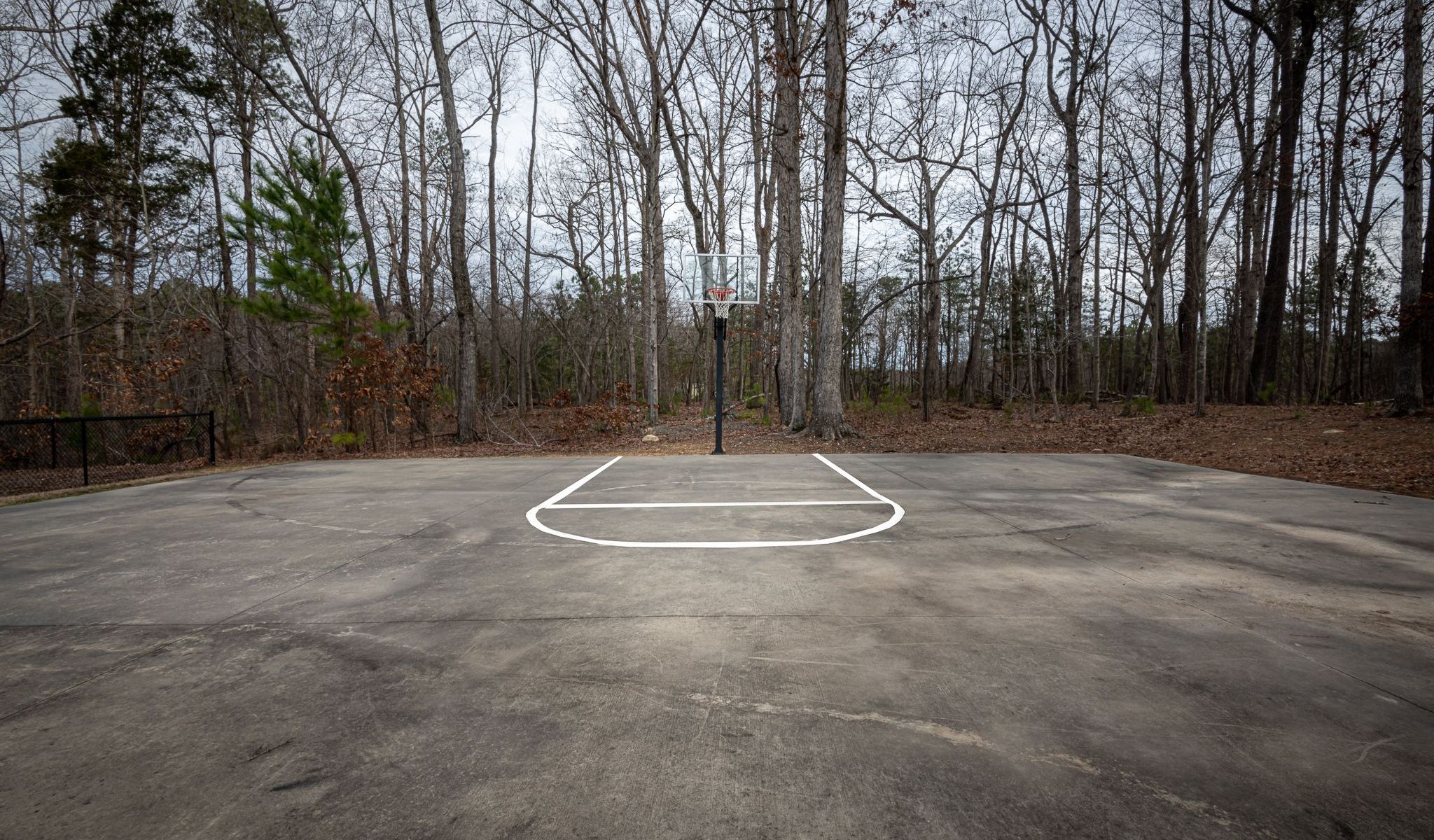 Chapel Hill North apartments resident outdoor half court basketball court