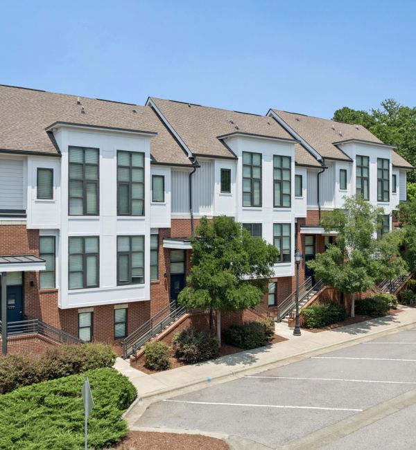 Chapel Hill North Apartments beautiful luxury townhome kitchen with island, stainless steel appliances, wine storage, and more